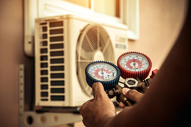 Professional Heat Pump Repair technician working in Micro, NC